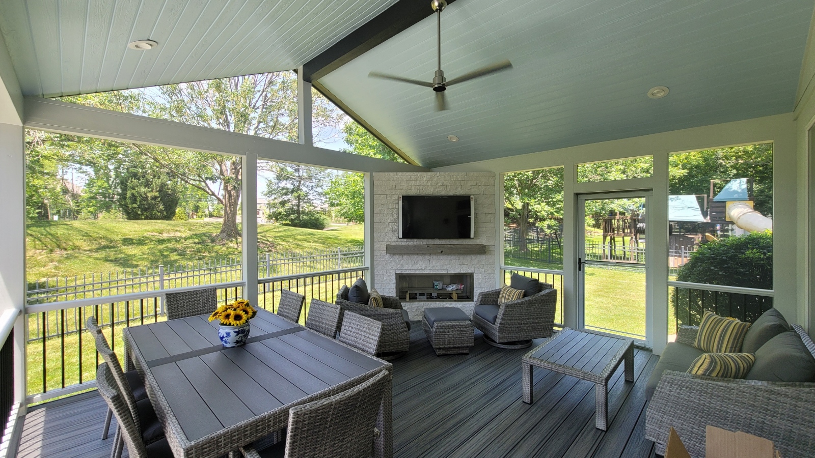 Large screened porch with dining area
