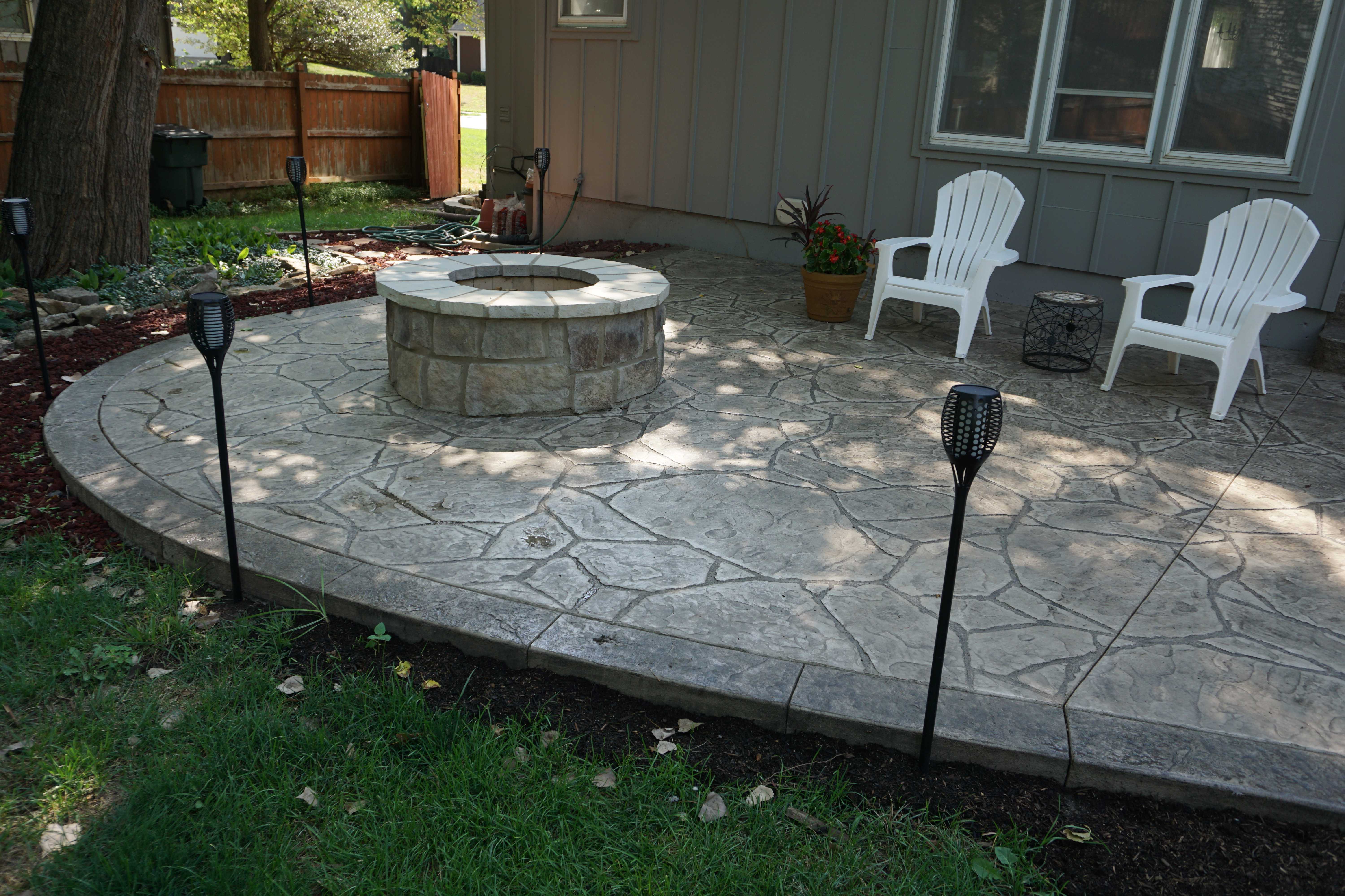 Flagstone patio with a fire pit