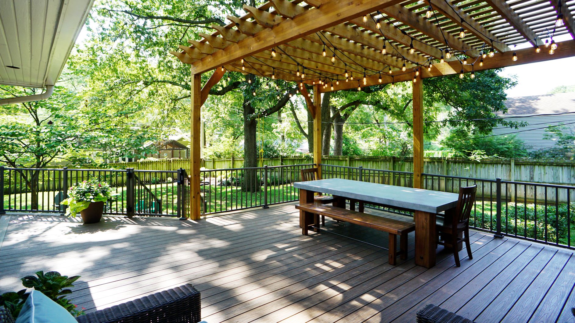 Deck with a pergola and string lights